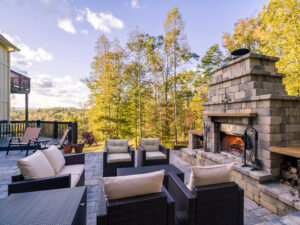 Outdoor stone fireplace with outdoor seating