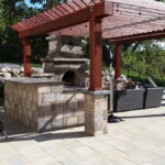outdoor brick patio gazibo firepit